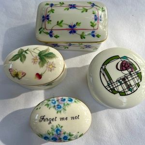 Four lovely china trinket boxes.